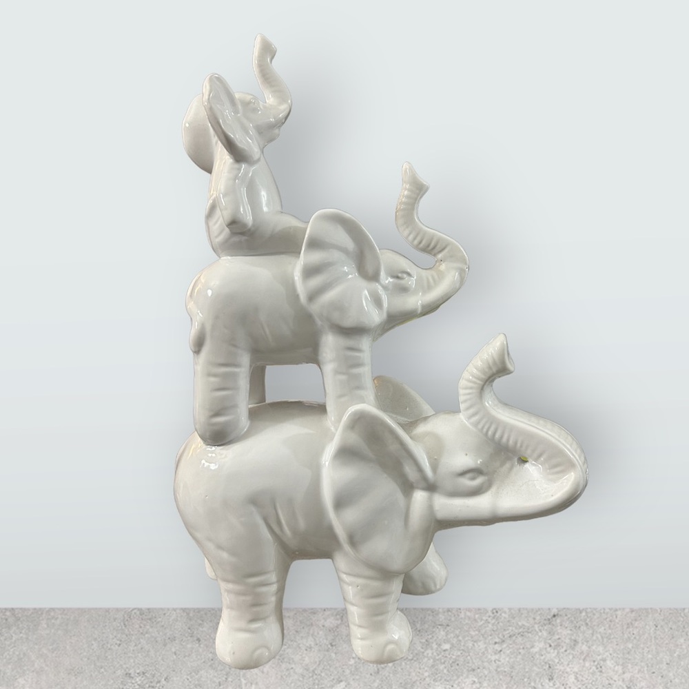 White Glass Stacked elephant decor piece.